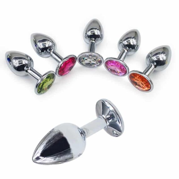 analni čep kovinski srebrne barve