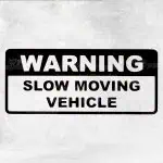 Nalepka WARNING Slow Vehicle Moving