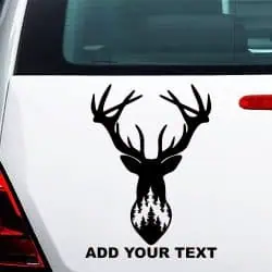 Nalepka jelenja glava z rogovi in gozdom